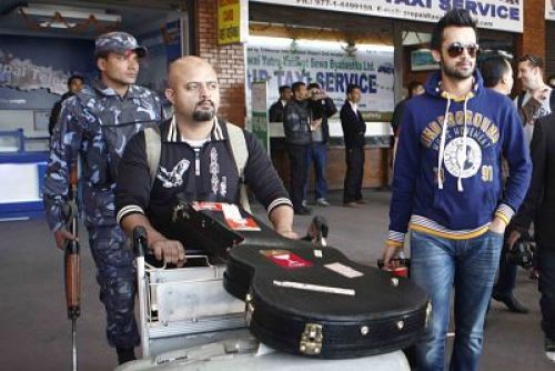 JUST IN TIME: Pakistani singer Atif Aslam (right) arrives at Tribhuwan International Airport on Friday afternoon. He put on a concert later in the evening at Dashrath Stadium .