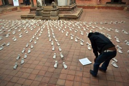 STEP BY STEP: A visitor at the Kathmandu International Art Festival inspects an installation at Patan Museum on Monday.