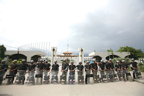 BANESWOR NINJA: Armed police guard the Constituent Assembly from demonstrators entering a restricted area on 5 July.