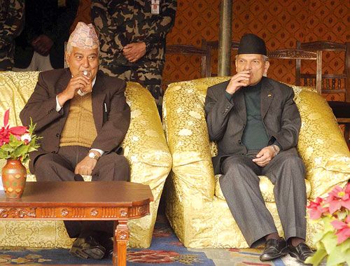 CHEERS: Prime Minister Baburam Bhattarai and Vice President Parmananda Jha during the International Human Rights Day program at Singha Darbar on Monday.