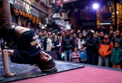 MUSIC FROM THE BLOCK: A youngster shows off his B-Boing dancing skills as the public watch in awe during the street festival in Thamel, on Sunday.