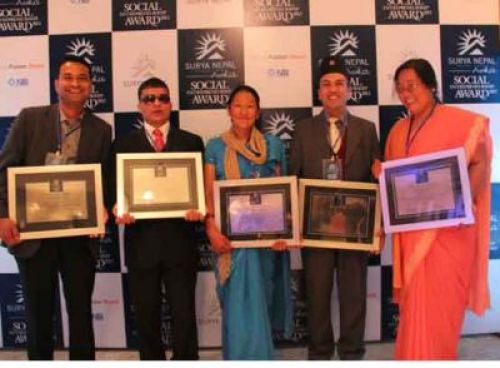 VICTORY SMILE: Winners of Surya Nepal Asha Social Entrepreneurship Award 2012 receive their prize at Hyatt Regency hotel, on Tuesday evening. In the picture from left to right, Dr. Bishal Dhakal, Chiranjeevi Poudel, Jasmaya Pun, Prachanda Shakya and Shanti Shakya Dolma.