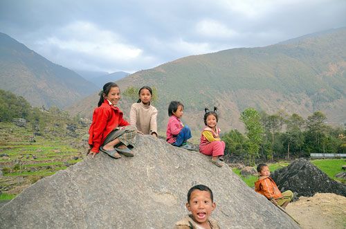 ON THE ROCKS: A group of children have fun and enjoy their holiday on a big boulder at Thangpalkot VDC, Sindhupalchok.