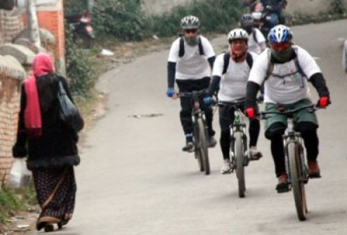 ECO-FRIENDLY: As part of Environment Clean Day, Army chief General Gaurav SJB Rana cycles to his office with a group of body guards, in Maitighar, on Friday morning.