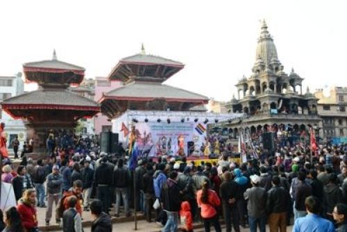 People gather to enjoy music and dancing performances at the three-day-long Lalitpur Cooperative Festival 2012, in Patan Durbar square, on Saturday.