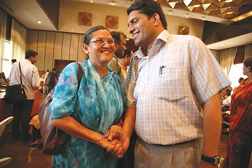 UML's vice-presidential nominee, Astha Laxmi Shakya and Maoist leader Khim Lal Devkota.