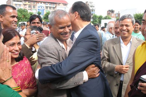 COMRADES IN ARMS: UML general secretary Jhala Nath Khanal gives best wishes to NC's presidential candidate Ram Baran Yadav, who is also supported by UML, MJF and other small parties, before polling for president started on Monday.