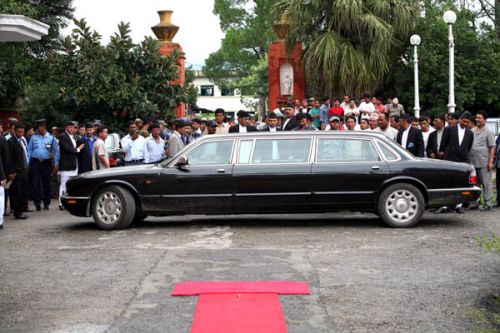 PRESIDENTIAL MOTORCADE: President Ram Baran Yadav arrives in a motorcade at Sital Nibas on Wednesday for his official swearing in. He was travelling in ex-king Gyanendra's black Jaguar.
