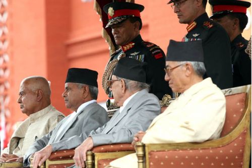 ALL THE PRESIDENT'S MEN: president Yadav and Prime Minister Koirala before the swearing in. COAS Gen Katuwal is standing behind.