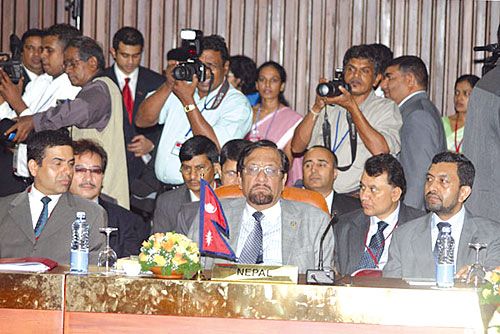 MEN IN SUITS: Finance Minister Ram Sharan Mahat and members of the Nepali delegation at a pre-Summit meeting of SAARC ministers in Colombo on Thursday morning. Prime Minister Koirala left for the Summit on Thursday afternoon via Delhi.