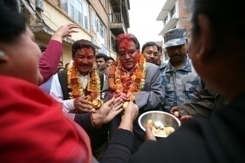 FROM BULLET TO BALLOT: With only two days of campaigning left, Maoist chairman Pushpa Kamal Dahal is greeted as he arrives for an election rally in Panga in Kiritipur, one of the two constituencies from which he standing in elections. The other is Rolpa.