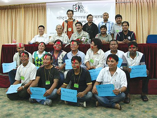 PHOTO OP: New and outgoing members of the National Forum of Photo Journalists pose for a photo after its election on Saturday.