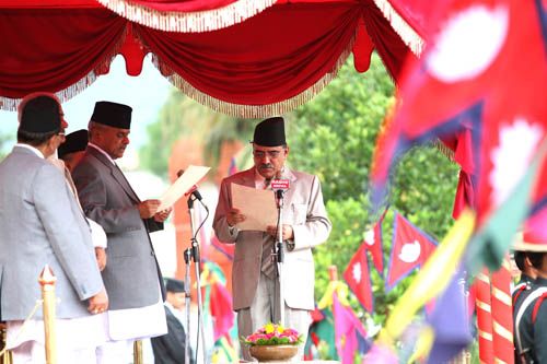 SWORN IN: President Ram Baran Yadav administers the oath of office to Prime Minister Pushpa Kamal Dahal at the Ratrapati Bhaban on Monday. Dahal deviated from the president's text of the oath, by saying he swore by the "people" and not "god".