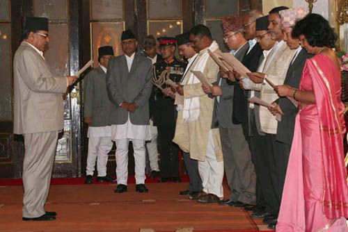 MORE SWEARING: Prime Minister Pushpa Kamal Dhal swears in the first batch of cabinet ministers in the presence of President Ram Baran Yadav. The UML ministers kept out of the ceremony because they were not satisfied with the protocol roll.