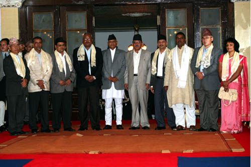 SMILE PLEASE: The newly sworn-in ministers pose for a picture with President Yadav and PM Dahal.