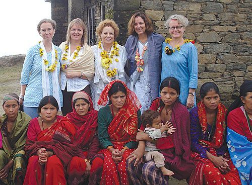 SISTERHOOD: Women in Dadheldura welcome Dominique Hyde (WFP), Bella Bird (DFID), Gillian Mellsop (UNICEF), Susan Goldmark (World Bank) and Pirkko-Liisa Kyostila (Finnish Embassy) on a field visit last week.
