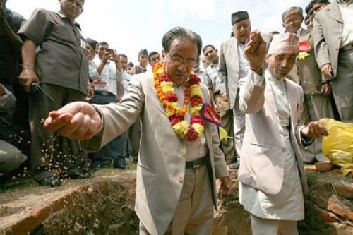 SPIRITUAL PREMIER: Prime Minsiter Pushpa Kamal Dahal offers rice to the spirits as he lays the foundtion stone of the new building of the Kanya Bahumukhi College in Dilli Bajar on Tuesday.