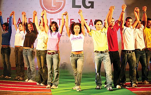 HOLDING HANDS: Nepali athletes walk the ramp at the Nepal Sports Journalist Forum's Player of the Year 2008 awards ceremony on Wednesday.