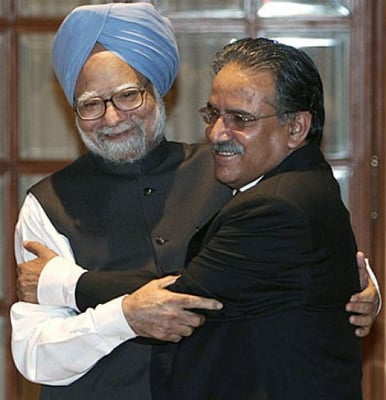 TIGHT EMBRACE: Indian Prime Minister Manmohan Singh and Prime Minister Pushpa Kamal Dahal hug each other ahead of their meeting on Monday evening in New Delhi. Dahal is on a four-day official visit and leaves for Bangalore on Tuesday.