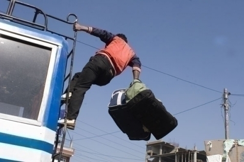 ON BOARD: Bags being loaded at Kalanki as people return to their villages to vote.