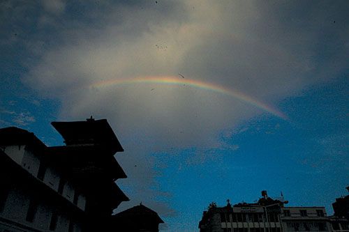 FESTIVE COLOURS: A rainbow hangs over the nine-storeyed temple at Basantapur Darbar Square on the last night of Indra Jatra on Sunday.