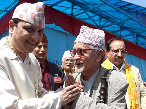 YESTERDAY'S MAN: Ex-king Gyanendra is greeted by a well-wisher at his first public apperance after vacating Narayanhiti, at Shyamashyam Dham in Thimi on Thursday.