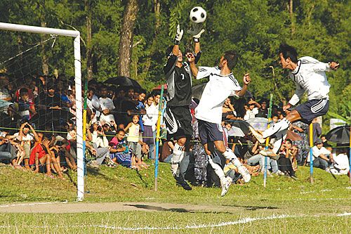 GREAT SAVE: NRT keeper Surendra Shrestha blocks a shot on goal from Gorkha 11 in Majhua Deurali in Gorkha on Saturday. The match marked the end of NRT's eight-venue national tour, organised by Nepa-laya to popularise football and engage youth in positive activities.