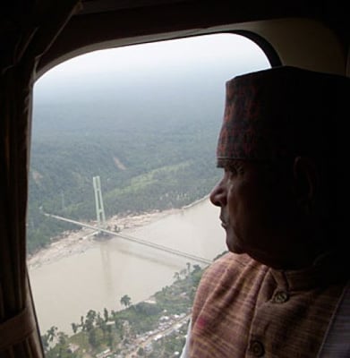 PRESIDENT'S EYE VIEW: President Yadav looks down on the Karnali Bridge at Chisapani during his visit to flood victims in the farwest this week.