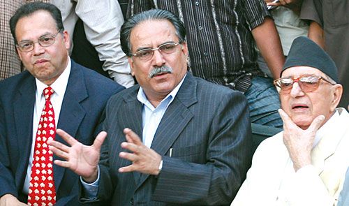 ONE FOR ALL AND ALL FOR ONE: The UML's Jhalnath Khanal, Prime Minister Pushpa Kamal Dahal and the NC's Girija Koirala at the UML tea party on Wednesday.