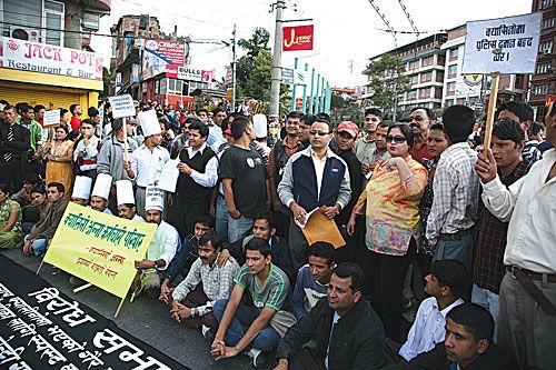 LAY THE ODDS: Kathmandu's casino employees protest at the Maitighar Mandala on Saturday against the attempted raid by Nepal Police in Casino Anna the night before.
