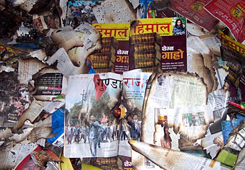RISING FROM THE ASHES: A pile of Himal Khabarpatrika magazines at the distributing station at Maitighar after an attack by masked men on Sunday night. The 16 November issue of the fortnightly contained an expose of the anarchy being created nationwide by militant youth groups.