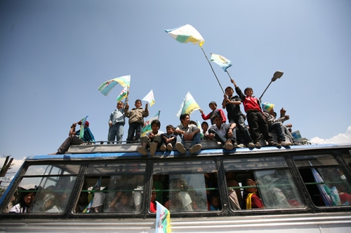 RIDING HIGH: RPP supporters being shuttled through Baneswor for a party rally on Monday.