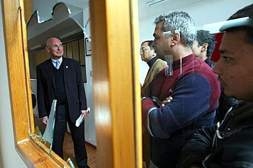 BROKEN REFLECTION: UNMIN's Ian Martin observes the aftermath of the attack on Himalmedia on Monday. He expressed shock and urged Maoists to take action against those invloved in the incident.