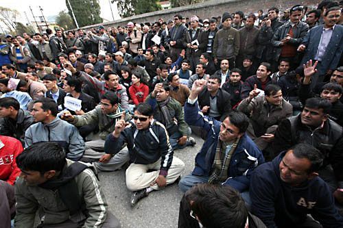 UNITED WE STAND: Journalists and free press supporters in Kathmandu stage a sit in protest in front of the south gate of Singa Darbar on Tuesday.