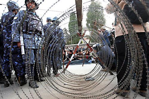 UNITED WE STAND: Journalists and free press supporters in Kathmandu stage a sit in protest in front of the south gate of Singa Darbar on Tuesday.