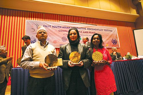 WINNER TAKES ALL: Mohan Mainali, director of The Wait Continues, won the third prize in the SAFMA Interactive Documentary Fesitval. Sharni Jayawardene (right) of Sri Lanka got the second prize for her film Defiant Art and Nasifa Saba Sahar of Afghanistan (centre) got the Special Jury Award.of Afghanistan (centre) got the Special Jury Award.
