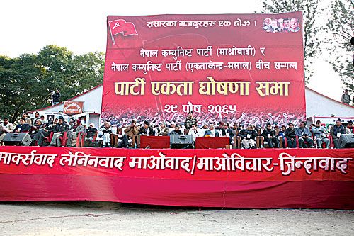 COME TOGETHER: CPN (Maoist) and Unity Centre (Masal) unite at a formal ceremony in Khula Manch on Tuesday where Prime Minister Pushpa Kamal Dahal threatened revolt if his government is overthrown.