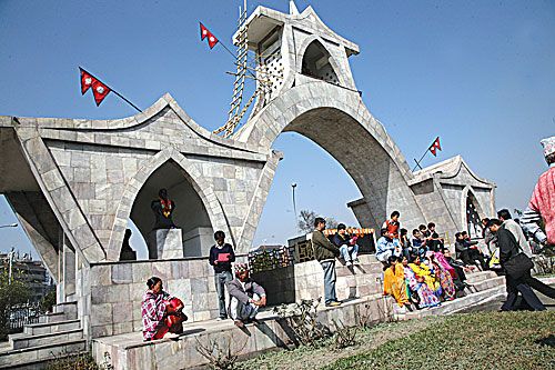 A DAY TO REMEMBER: Locals pay respect to the martyrs at the Sahid Gate on Thursday to mark Martyrs' Day.
