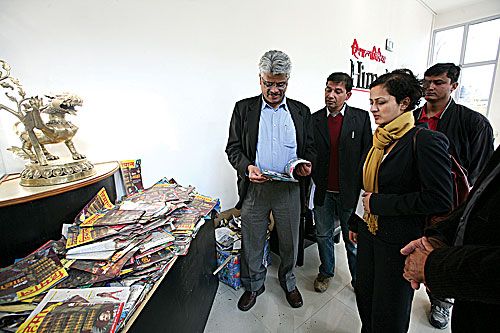 MEASURING FREEDOM: Representatives from International Federation of Journalists and ARTICLE 19 inspect burnt copies of Himal Khabarpatrika during their visit to Himalmedia on Saturday.