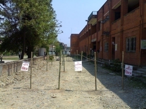 CROWD CONTROL: Voting stations have been laid out carefully. This one at Mahendra Adarsha Bidhyashram, school in Satdobato has separate lines for men and women to queue.