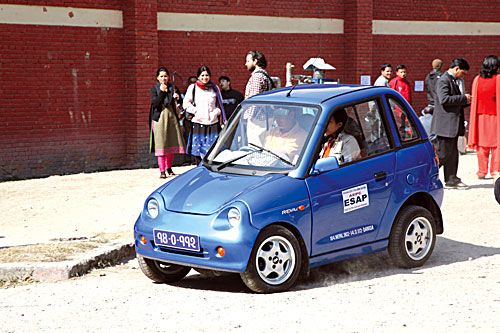 CLEAN CHOICE: An electric REVA car being test-driven at the Alternative Energy Fair at Bhrikuti Mandap on Sunday.
