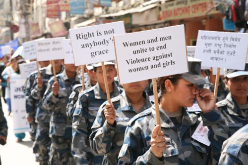 STRENGTH OF A WOMAN: The women officers of the Armed Police Force rally in Kathmandu on Sunday, marking the 99th Women's day.
