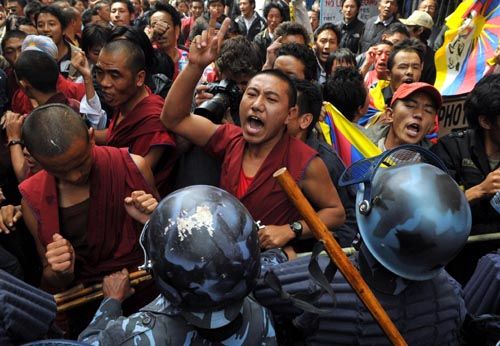 CRY FREEDOM:Tibet supporters clash with the police at Boudhanath on Tuesday in an anti-China demonstration on the 50th anniversary of the Tibet Uprising. However, noone was arrested. Although the government had tightened security to prevent any such protests, no other demonstrations were staged.