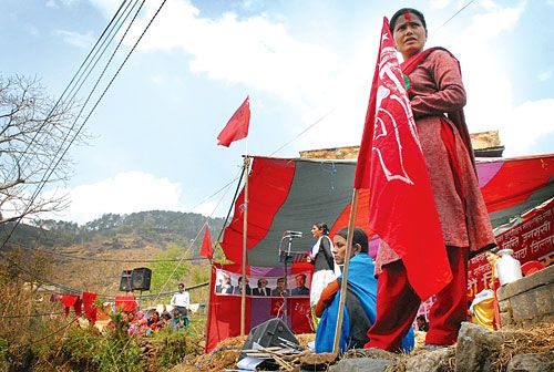 GORKHALI WOMEN: Maoist women leaders speak about the new constitution at a district conference in Gorkha on Monday. Maoist brigadier commander Kamala Naharki, who broke out of jail eight years ago, addresses the gathering.