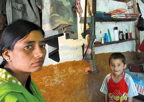 LAZY DAYS: Maoist ex-guerrilla Nisana and her four-year-old son Nirak Khadka while their time away in the Surkhet cantonment.