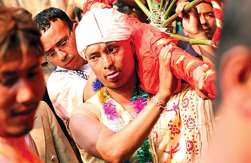 UPHOLDING CUSTOM: A local visits temples after piercing his tongue according to Newari tradition to mark the annual Jibro Chhedne Jatra in Bode, Sano Thimi on Wednesday.