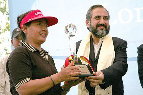 TOP OF HER GAME: Pakistani Ambassador to Nepal, Syed Abrar Hussain presents the trophy to Shastika Shrestha who won the ladies' round at the annual Ambassador's Golf Cup on Saturday.