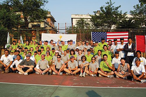 AMERICAN ACE: The Commonwealth and US tennis teams celebrate after the US won the Quetta Cup double's tournament at Phora Darbar on Saturday.