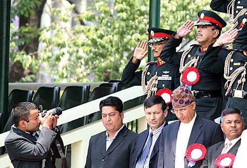 SHUTTERBUG: PM Pushpa Kamal Dahal's son, Prakash Dahal, takes pictures of Army Chief Rookmangud Katawal, Lt Gen Kul Bahadur Khadka and Lt Gen Chhatra Man Singh Gurung at Khula Manch on the third Loktantra Dibas.
