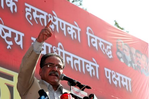 UNITED AGAINST: Caretaker Prime Minister Pushpa Kamal Dahal addresses the Maoist mass meet organised against the President's move at Tundikhel on Sunday.